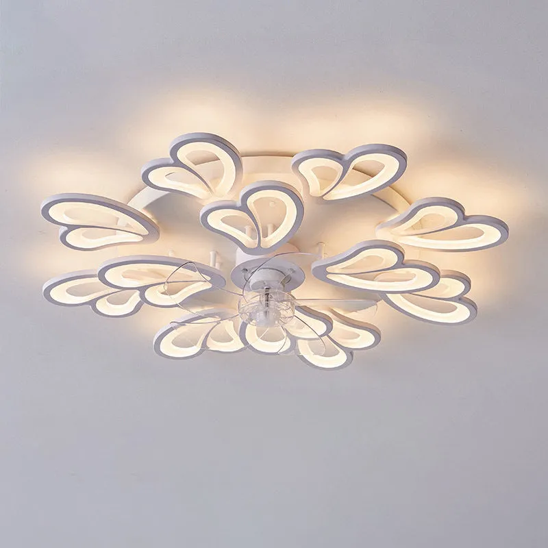 Modern white ceiling fan light with six-blade design and integrated light fitting on a room ceiling.