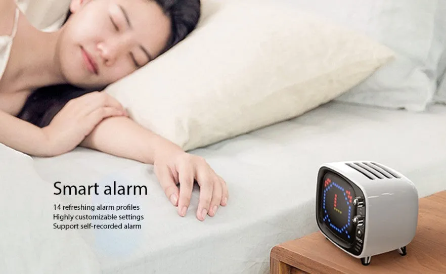 Portable Bluetooth speaker and alarm clock unit in one of six colour options: black, blue, green, pink, red, or white.