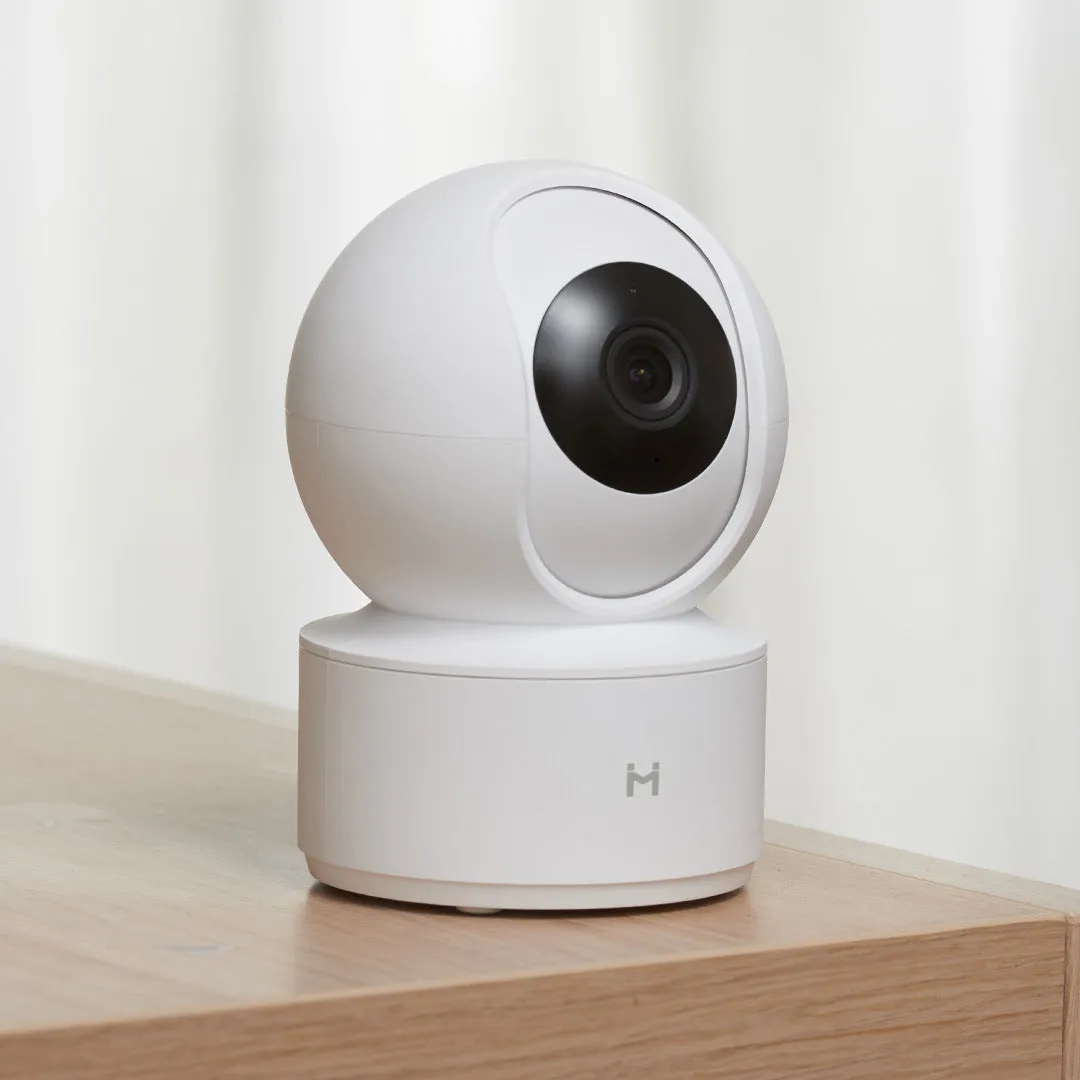 White Xiaobai smart security camera showing front view with lens