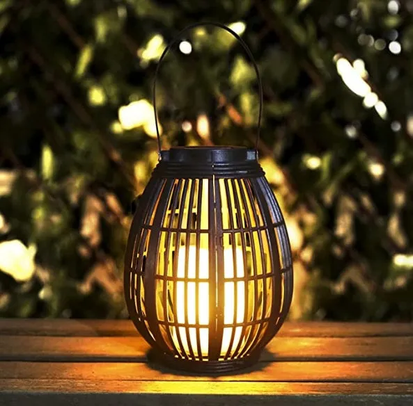Retro oval rattan solar garden light for patio illumination with plastic construction