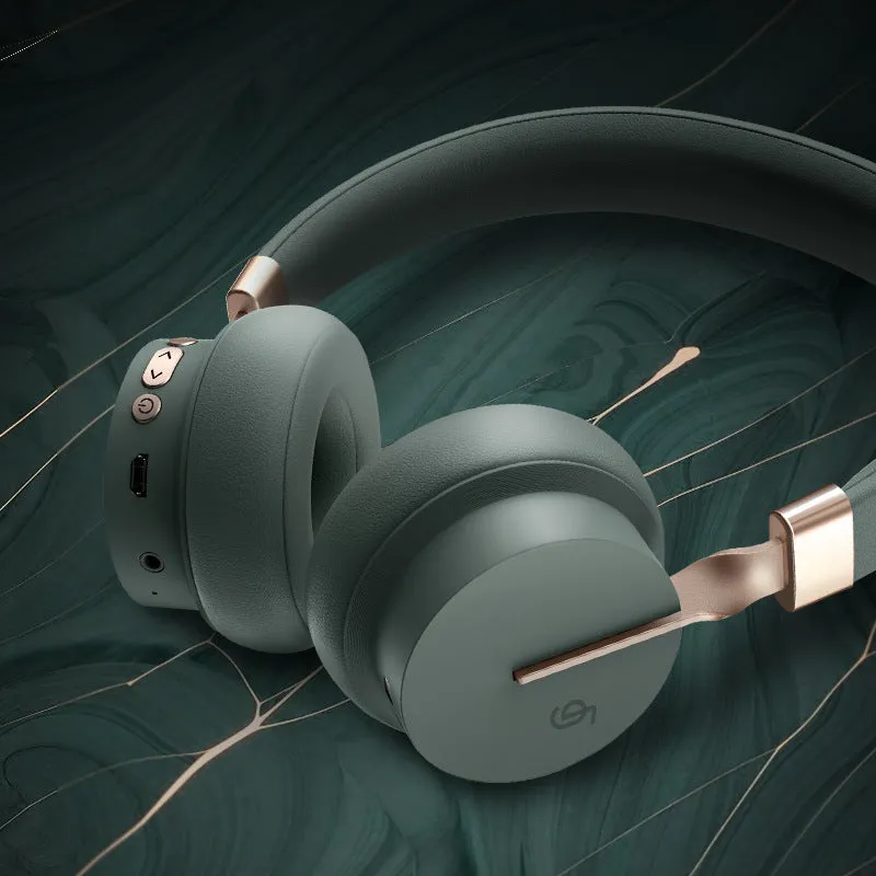 Head-mounted Bluetooth headset shown in solid green, black, red, blue, and white colour options.