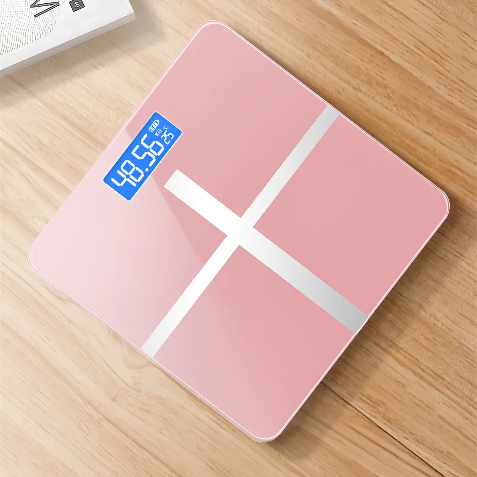 Digital bathroom weight scale with USB rechargeable feature in black, rose red, and white colour options.