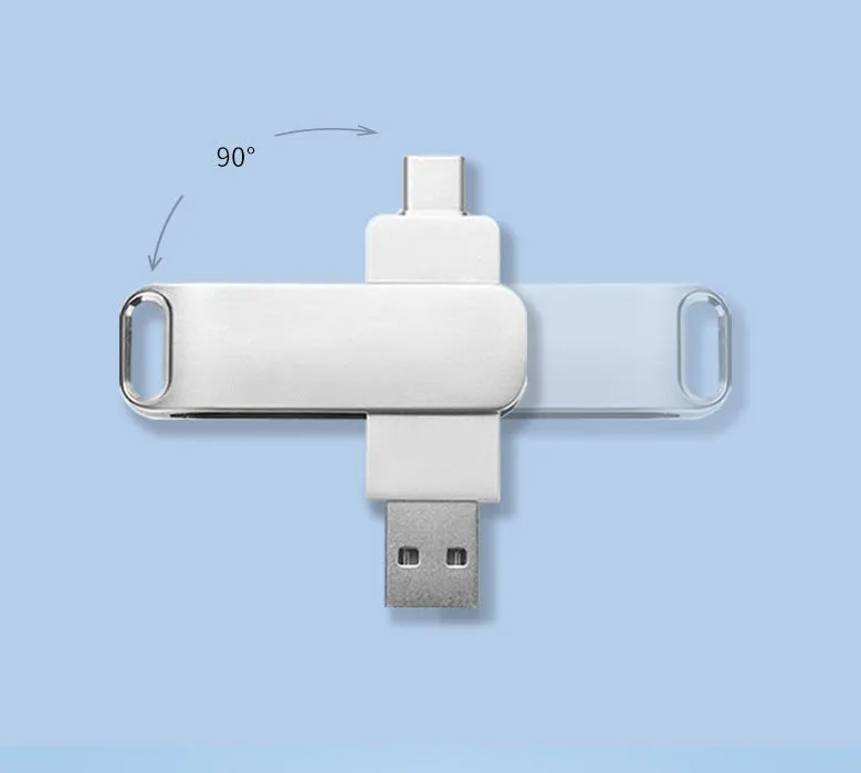 Rotating metal USB flash drive showing USB and USB-C connectors with black finish and protective iron box packaging