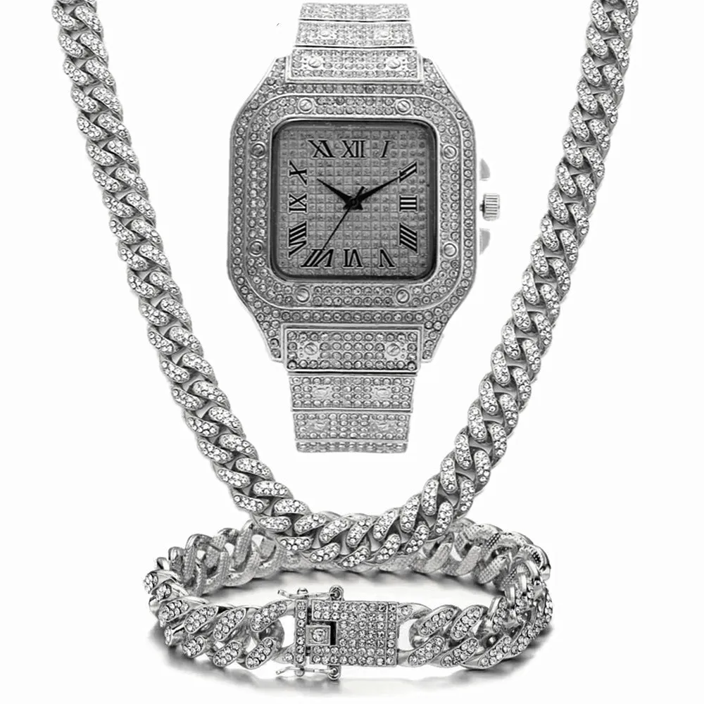 Square Roman numeral quartz watch with diamond studs on black mesh band, with matching bracelet and necklace.