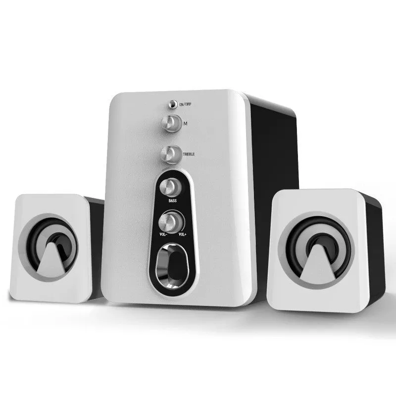 Mini black and white USB-powered 2.1 computer speaker system with subwoofer on a desktop.