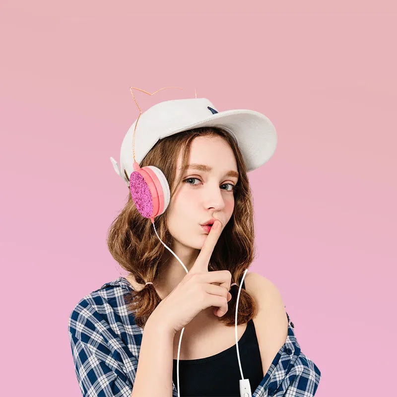 Wired over-ear headphones with microphone in black, blue, pink or yellow colour options on a white background