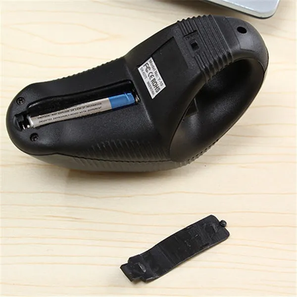 Black wireless trackball mouse with six buttons and USB receiver for laptop use