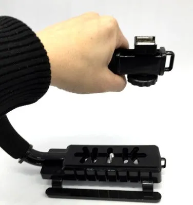 C-type handheld camera stabiliser bracket for DSLR cameras with plastic construction and sponge elements