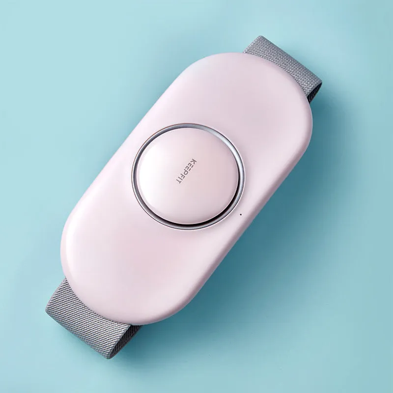 Wireless remote control waist massager in white colour with four large massage heads and USB cable.