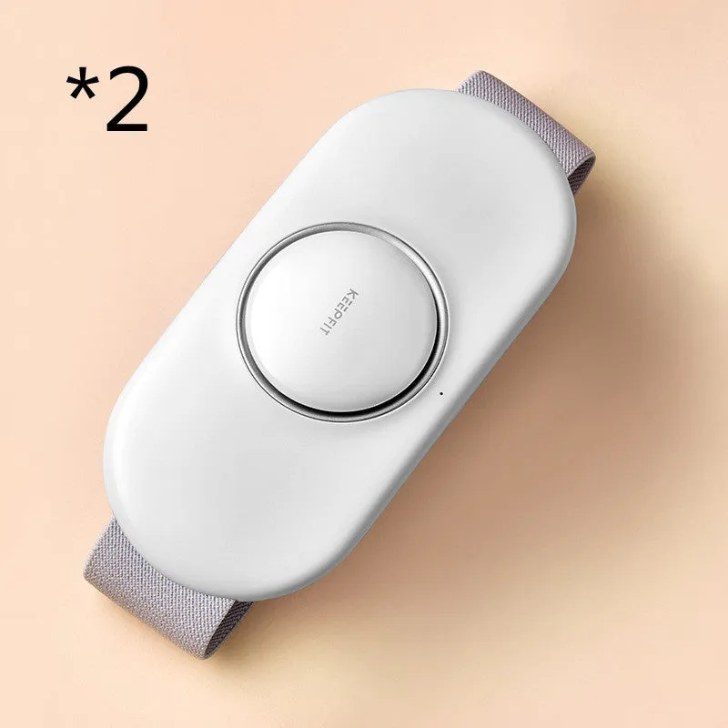Wireless remote control waist massager in white colour with four large massage heads and USB cable.