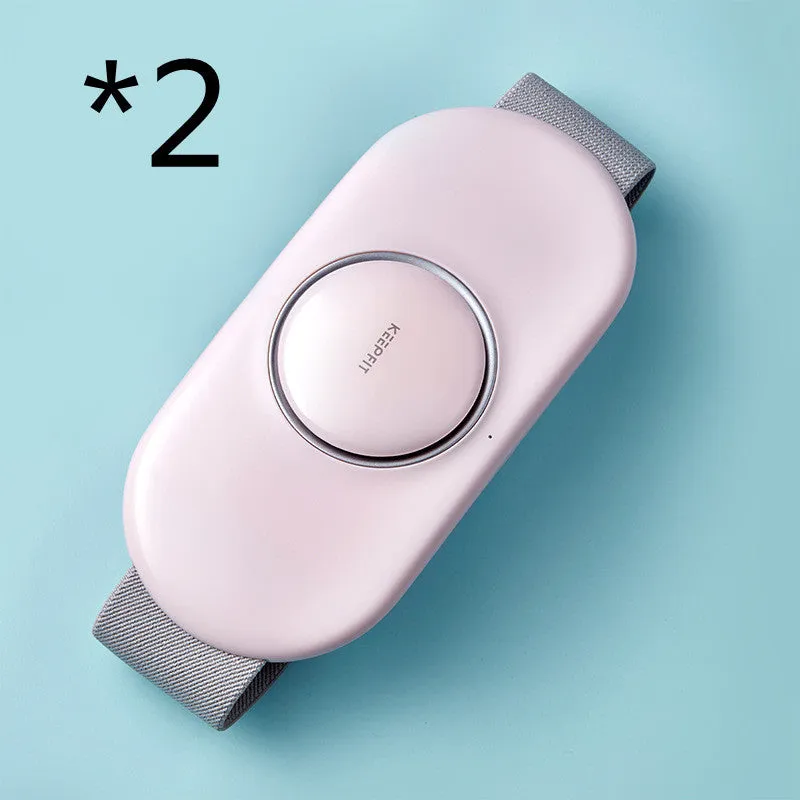 Wireless remote control waist massager in white colour with four large massage heads and USB cable.