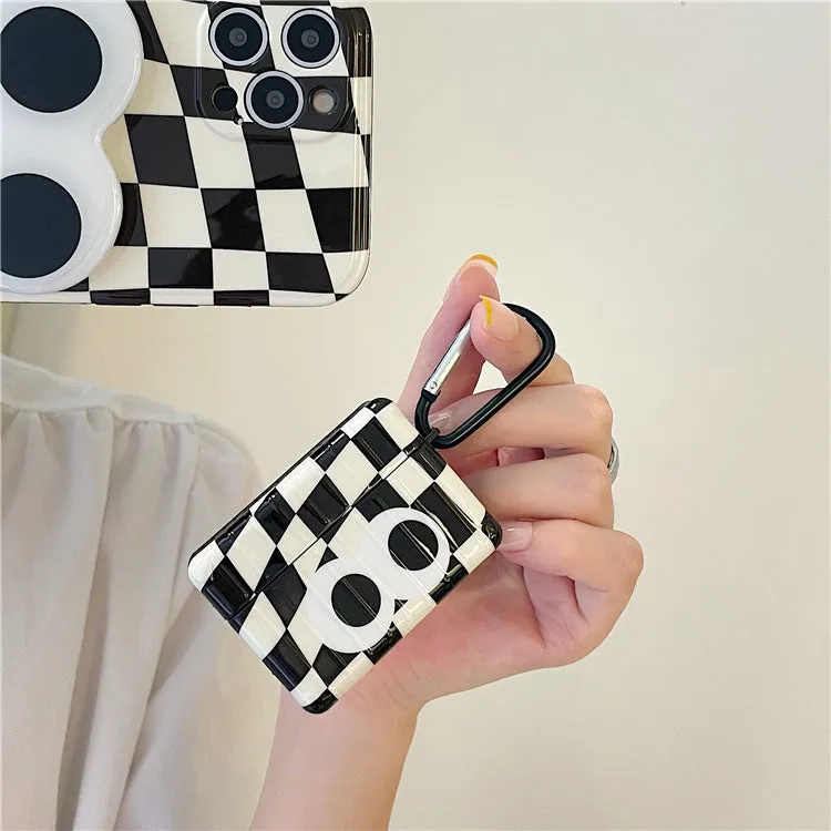 Checkerboard black and white grid TPU protective cover with large cartoon eyes for AirPods 1 2 3
