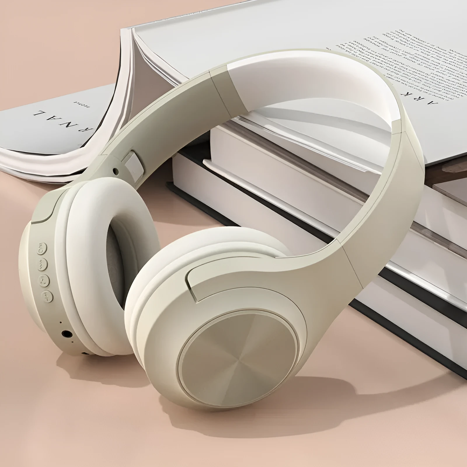 A creative head-mounted wireless Bluetooth headset in youth green colour with its matching charging case.