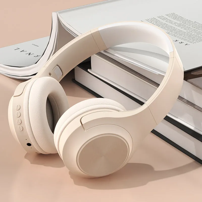 A creative head-mounted wireless Bluetooth headset in youth green colour with its matching charging case.