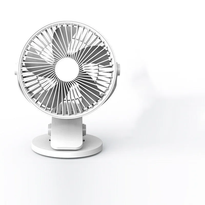 USB mini clip fan in green with clip base on wooden desk showing 135mm blade
