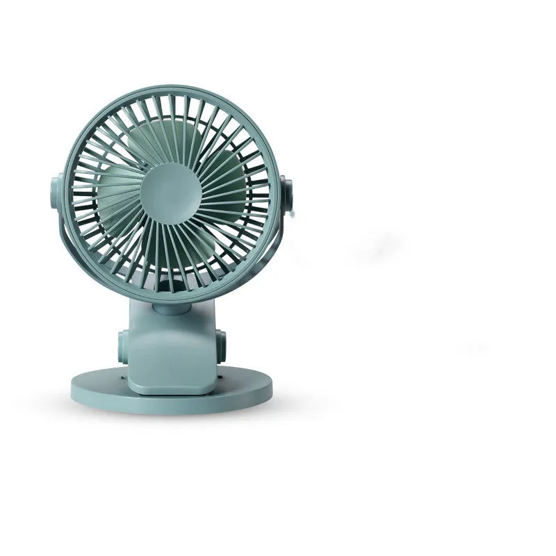 USB mini clip fan in green with clip base on wooden desk showing 135mm blade