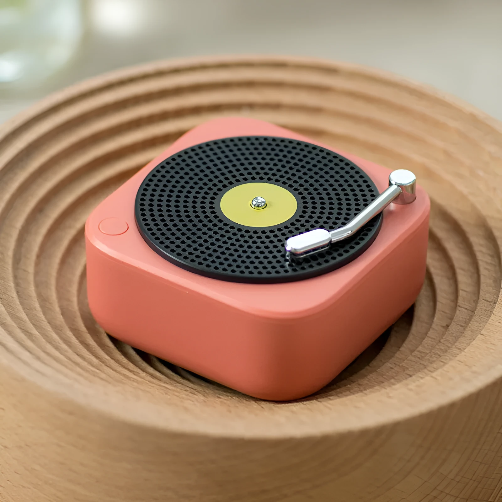 Wireless mini portable Bluetooth speaker in compact design with USB charging, available in blue, green, orange, white colours