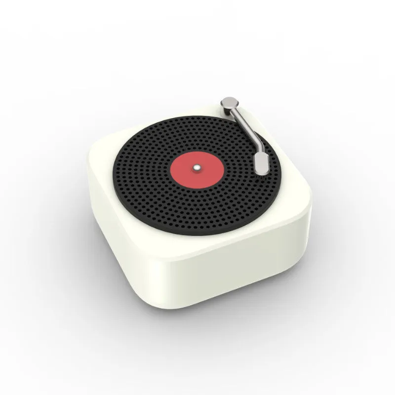 Wireless mini portable Bluetooth speaker in compact design with USB charging, available in blue, green, orange, white colours