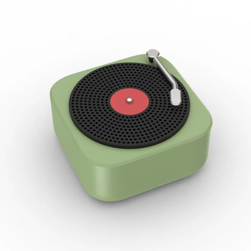 Wireless mini portable Bluetooth speaker in compact design with USB charging, available in blue, green, orange, white colours