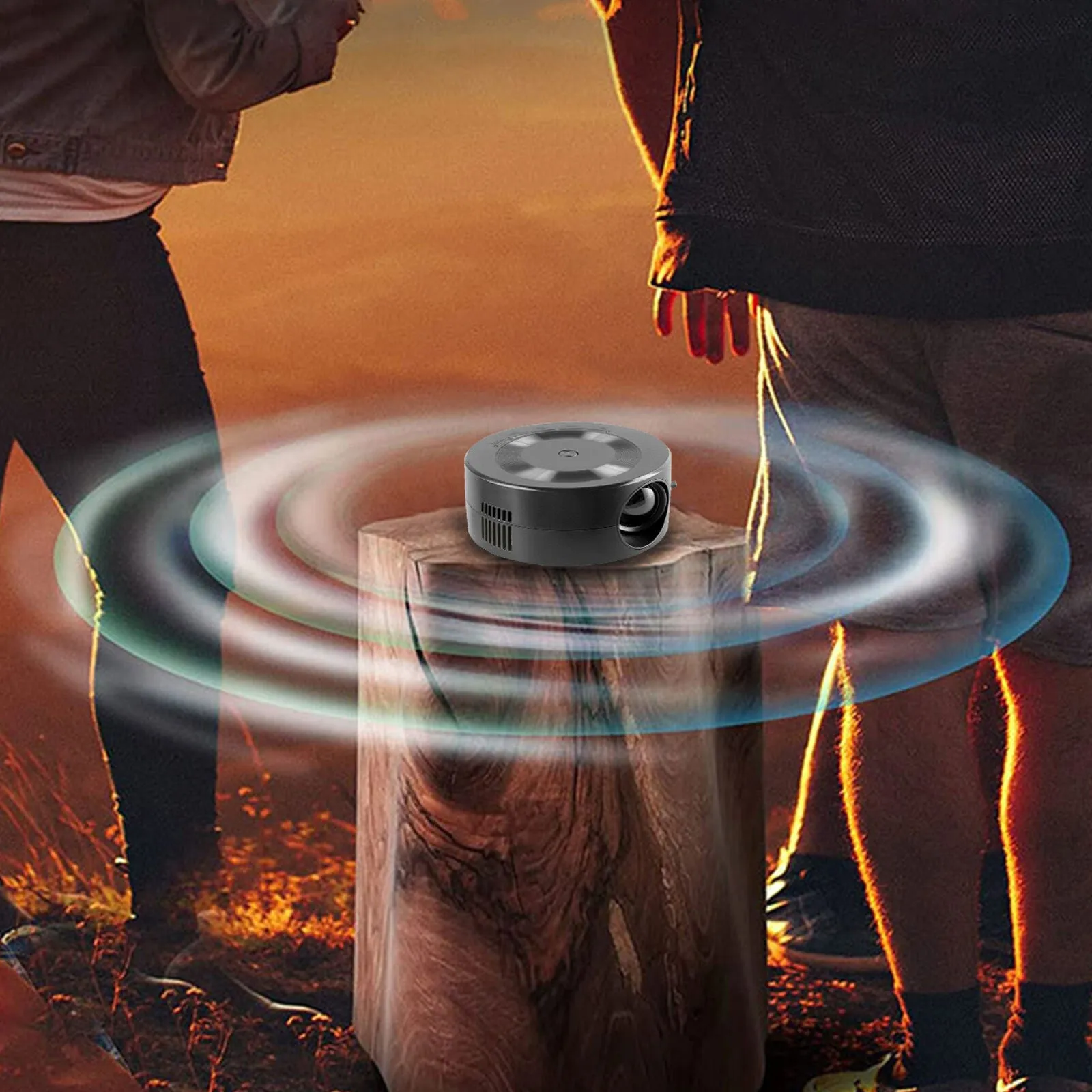 Black portable 1080p wired mobile projector with USB power cable on a surface