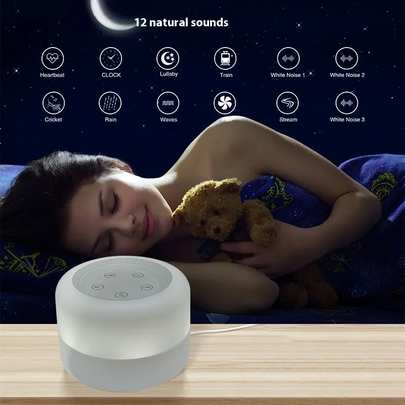 White rechargeable white noise sleeping aid table lamp with colourful lights on bedside table