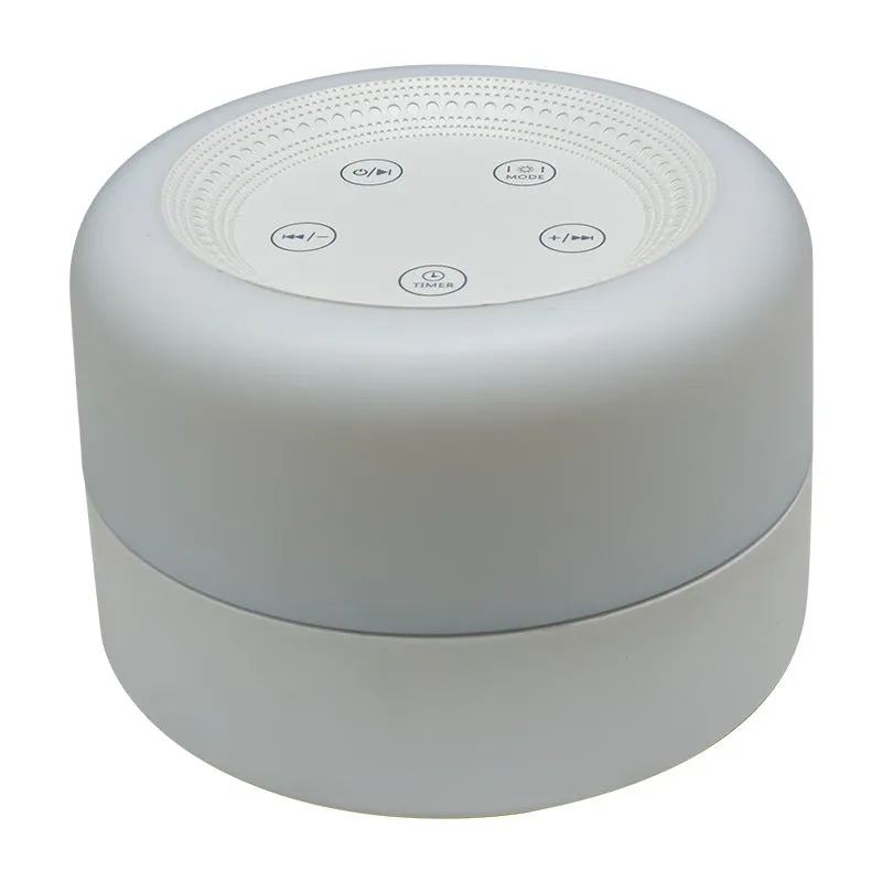 White rechargeable white noise sleeping aid table lamp with colourful lights on bedside table