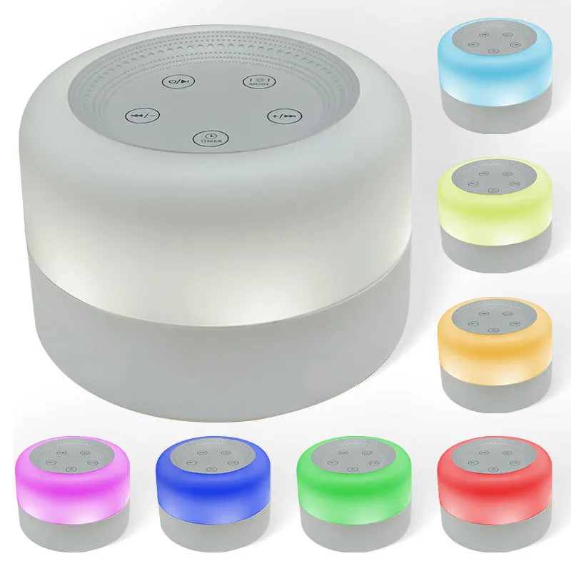 White rechargeable white noise sleeping aid table lamp with colourful lights on bedside table