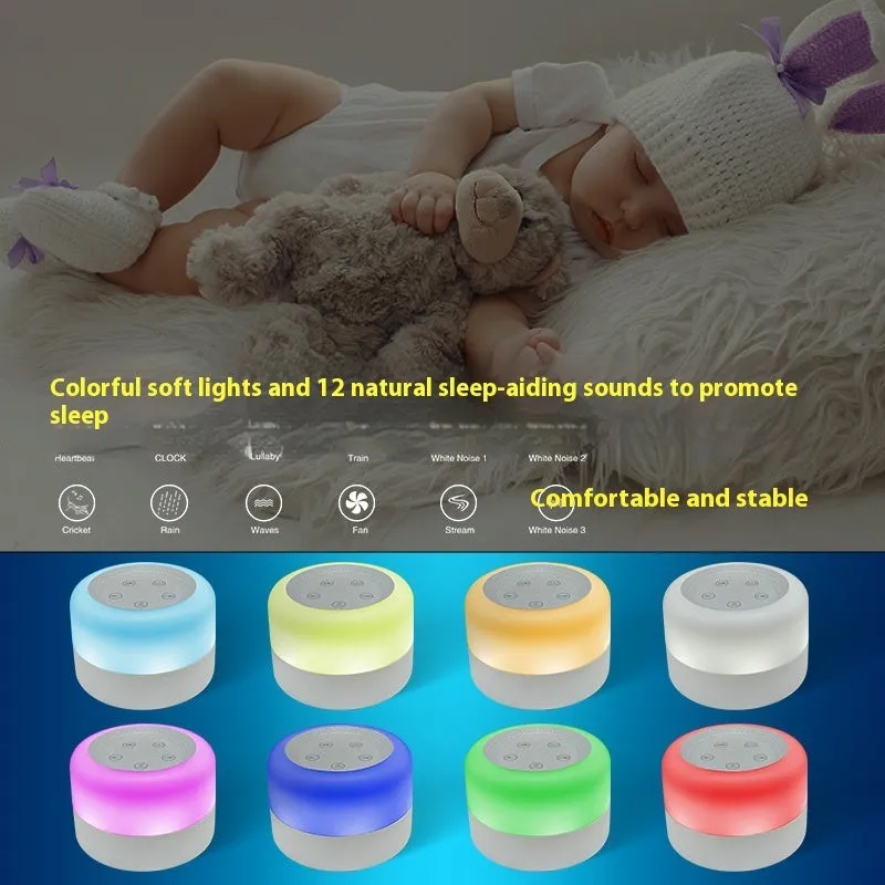 White rechargeable white noise sleeping aid table lamp with colourful lights on bedside table