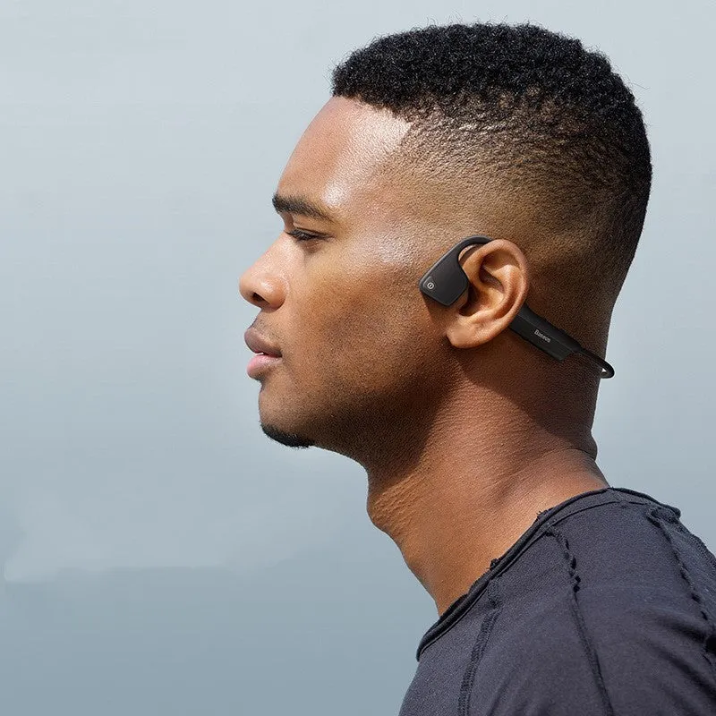 Black stereo waterproof wireless running headphones with hanging ear design