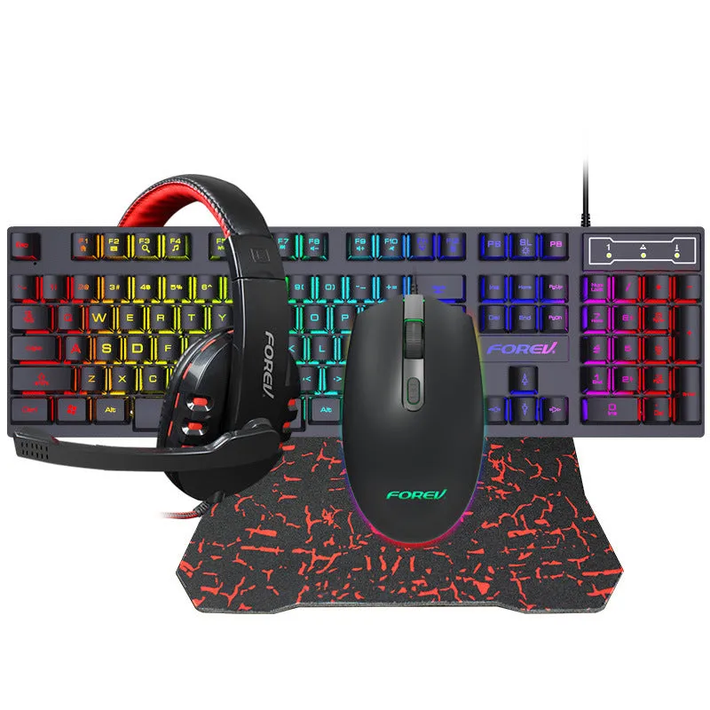 Four piece wired computer accessory set with keyboard, mouse, earphone, and mouse pad on a desk
