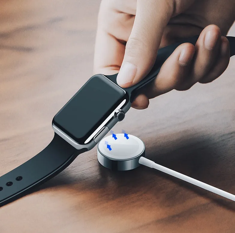 White metal Apple Watch wireless charger with 1m USB cable on a table