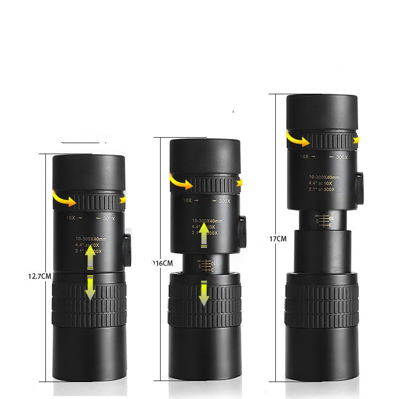 Monocular 10-300x40 zoom telescope with telescopic tripod bracket and universal mobile phone clip on a table