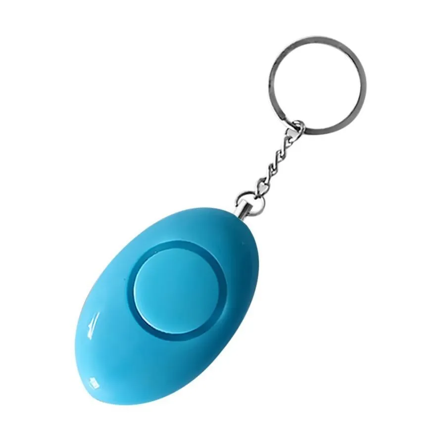 Egg-shaped personal safety alarm keychain in pink with metal pin on a white background