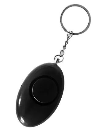 Egg-shaped personal safety alarm keychain in pink with metal pin on a white background