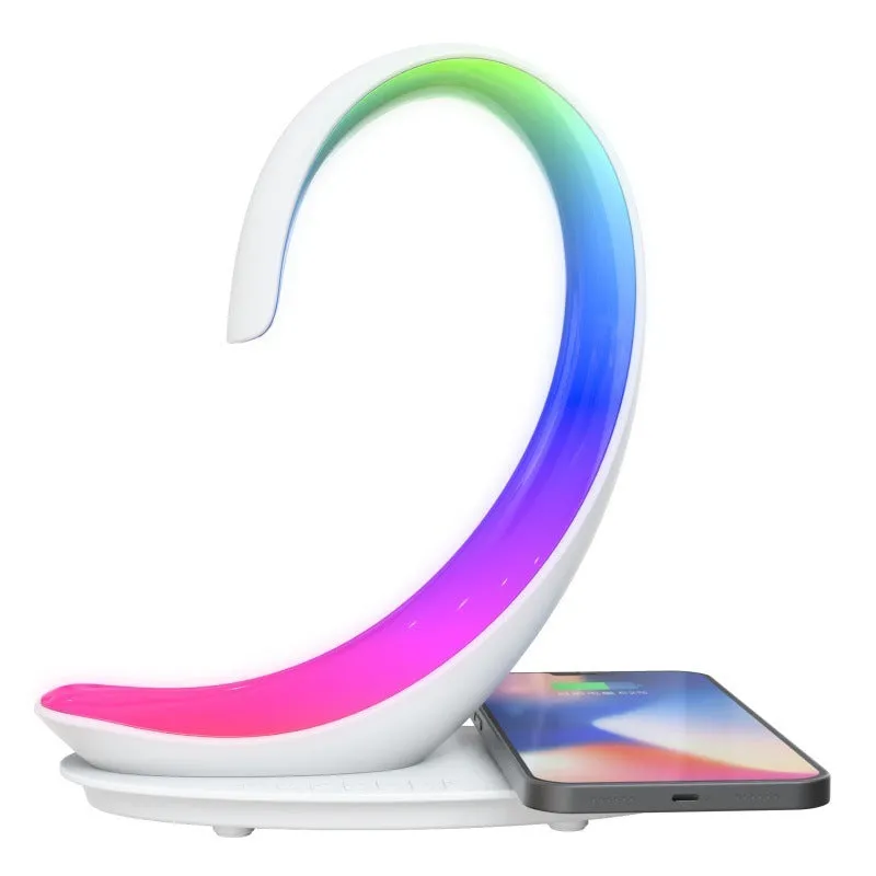 White swan decorative desk lamp with colourful RGB lighting, Bluetooth speaker, and wireless charging pad