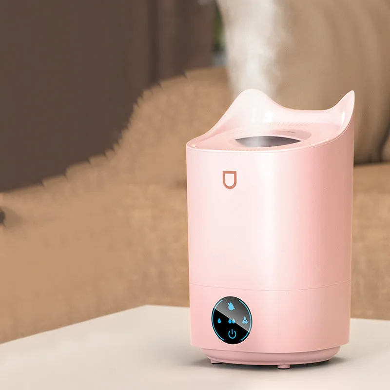 Coral Pink and Glacier White USB double spray humidifier with three mist outlets on a table.