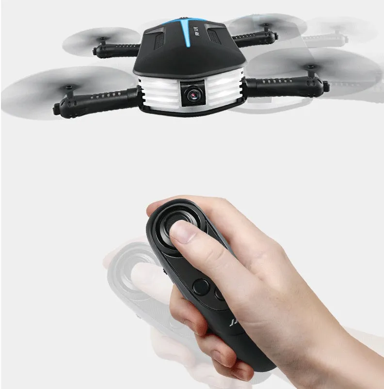 Black gravity-sensing four-axis folding drone with HD camera on a white background