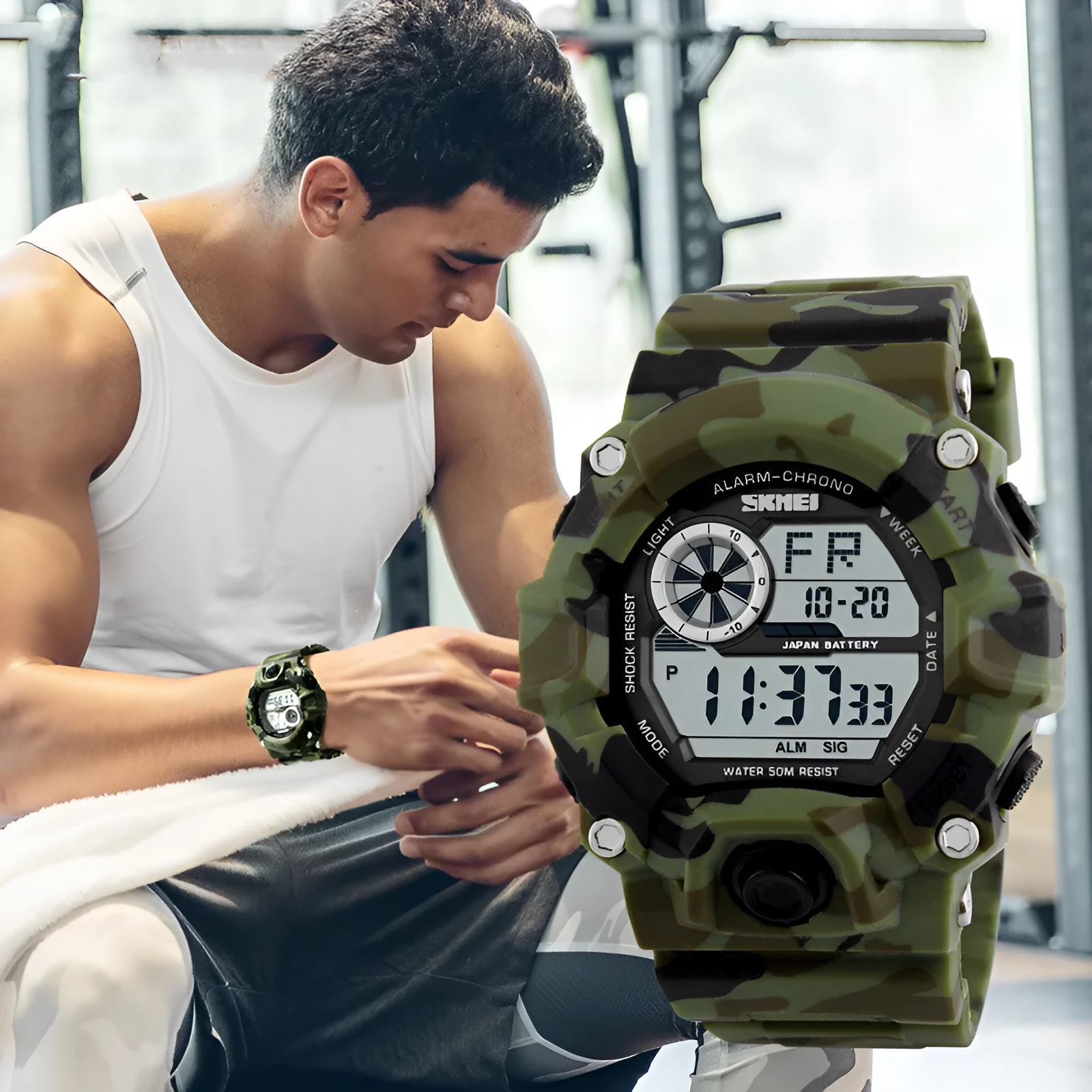 Multifunctional men's waterproof electronic sports watch with round dial on plastic strap.