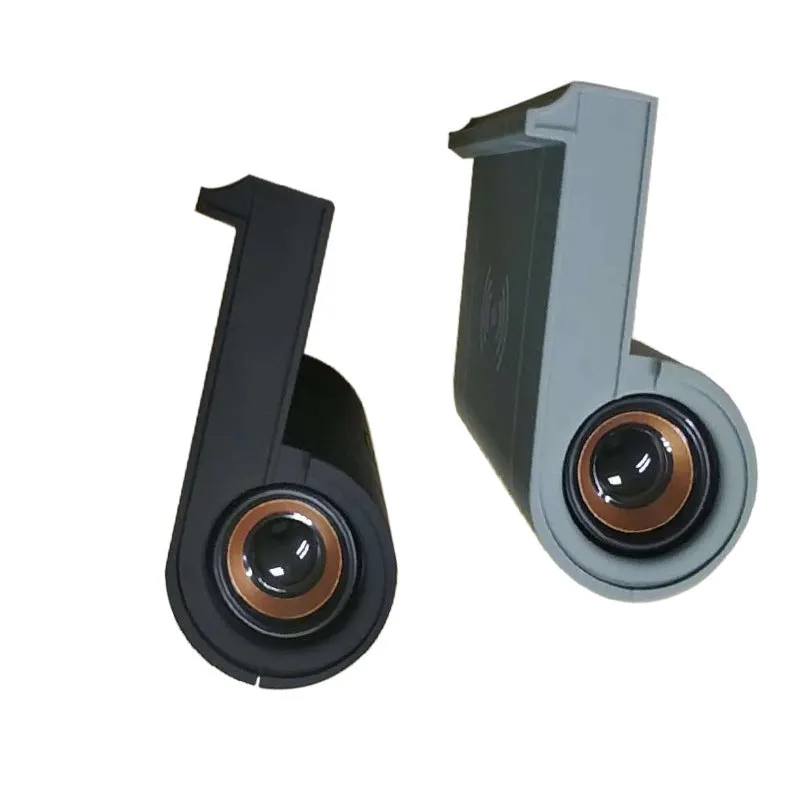New creative wireless Bluetooth speaker in black with shaking sound and wireless charging function