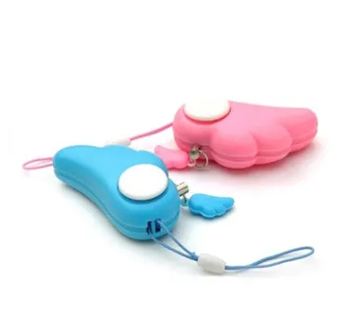Blue personal security alarm clipped to a handbag strap, compact size 6cm x 3cm