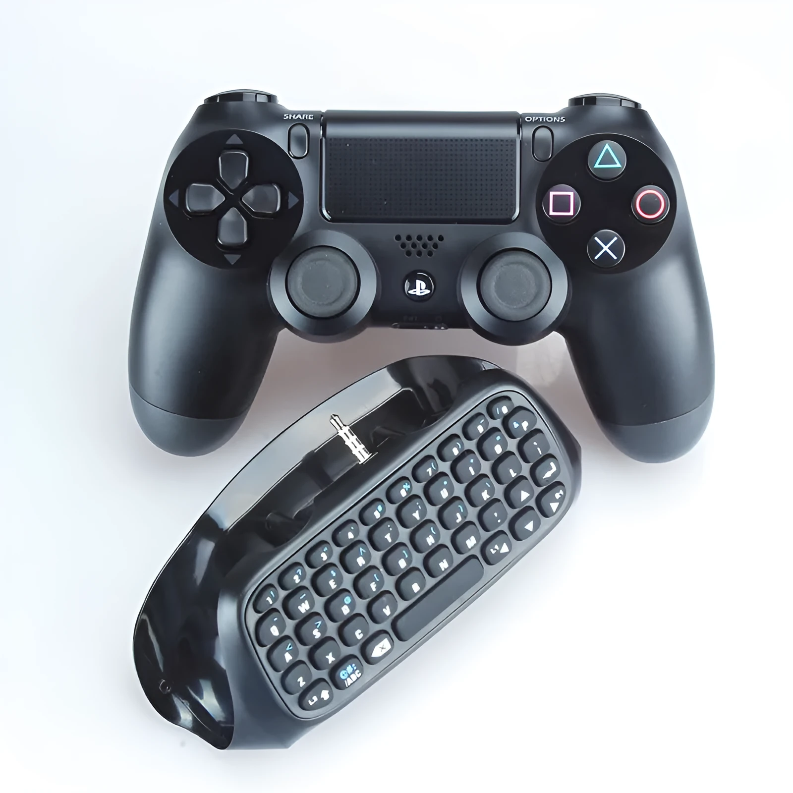 PS4 controller Bluetooth chat keypad attached to black controller showing keys and speaker