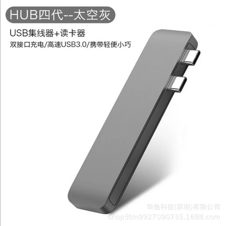 Compact USB-C hub with dual Type-C ports and SD card slot in grey aluminium finish