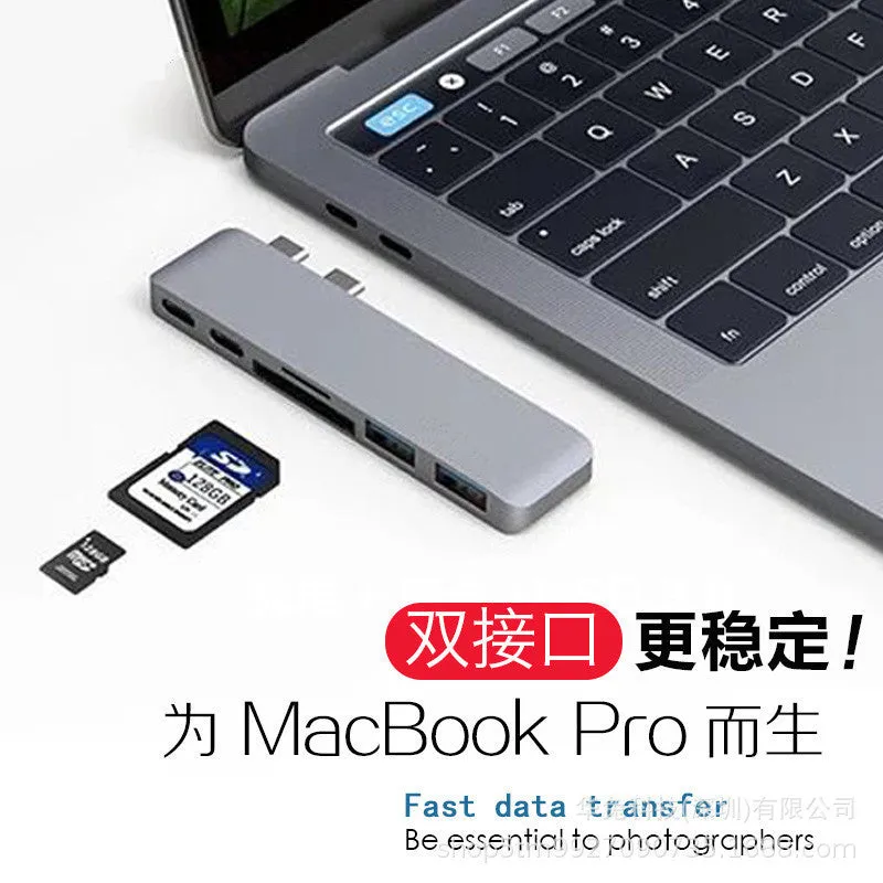 Compact USB-C hub with dual Type-C ports and SD card slot in grey aluminium finish