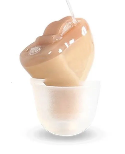 ABS hearing aid in skin colour for left ear with lightweight plastic housing
