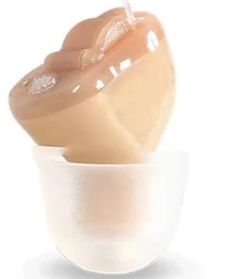 ABS hearing aid in skin colour for left ear with lightweight plastic housing