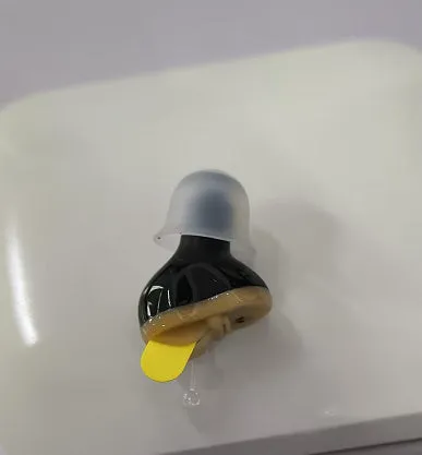 ABS hearing aid in skin colour for left ear with lightweight plastic housing