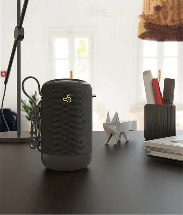 Wireless Bluetooth speaker with black waterproof mesh and leather shell for phone, computer, and car use