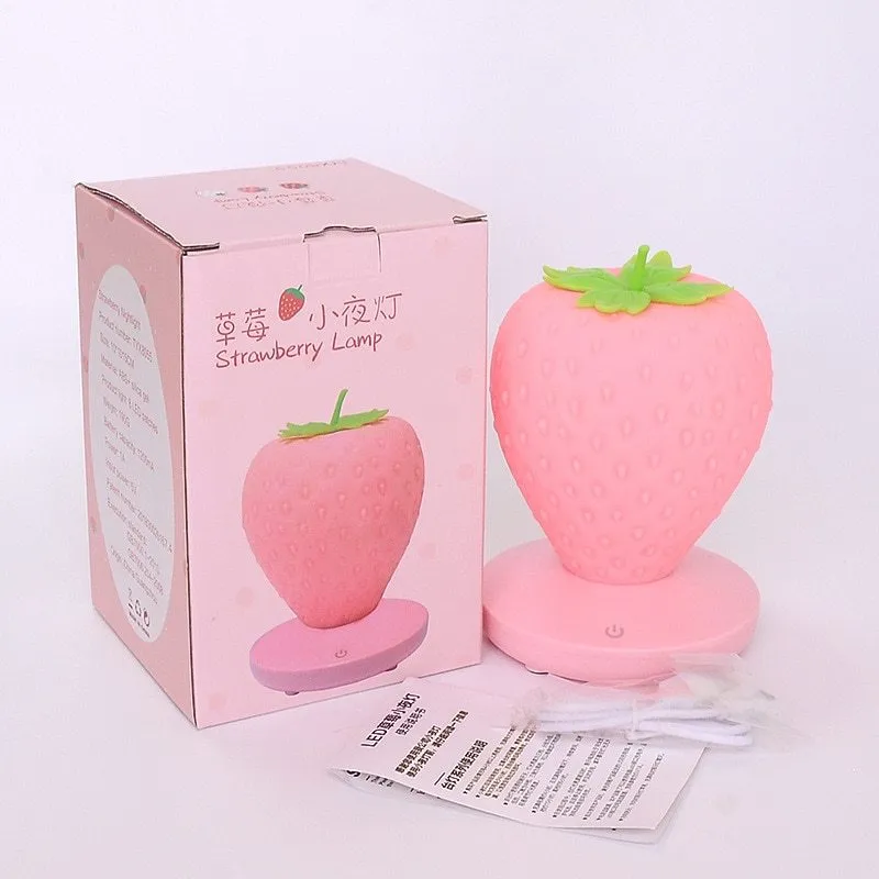 Strawberry-shaped silicone night light with USB charging, touch control, and LED glow, 10cm tall