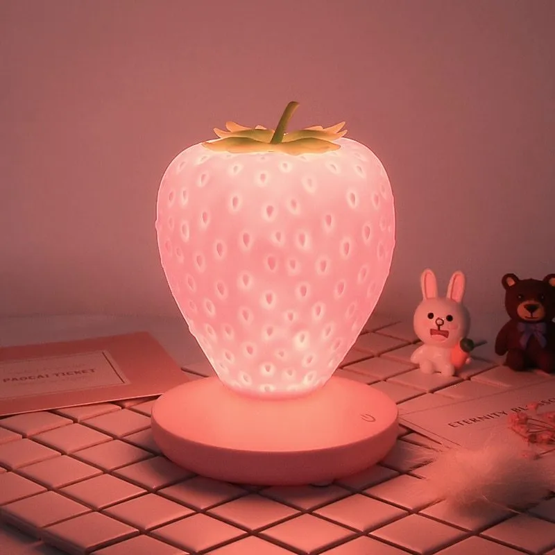 Strawberry-shaped silicone night light with USB charging, touch control, and LED glow, 10cm tall