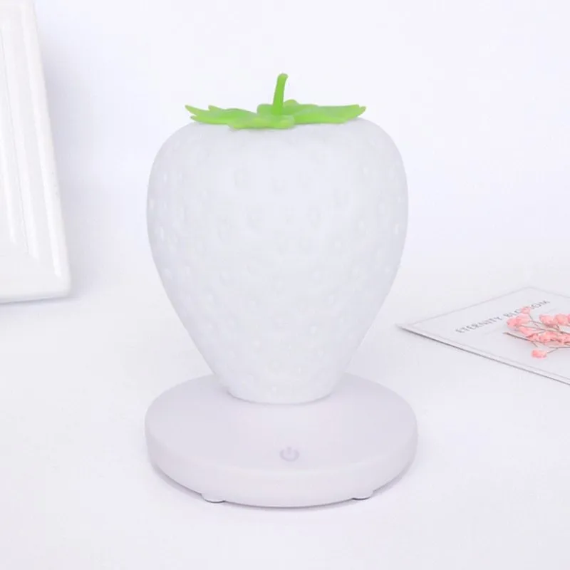 Strawberry-shaped silicone night light with USB charging, touch control, and LED glow, 10cm tall